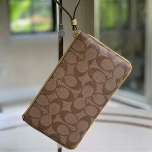 Brown Coach Monogram Wristlet